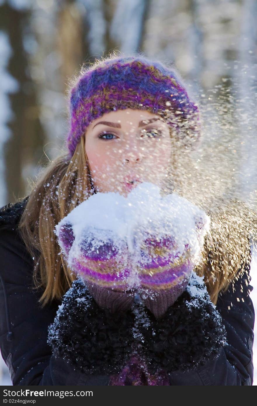 Portrait of beautiful adult girl outdoor in winter