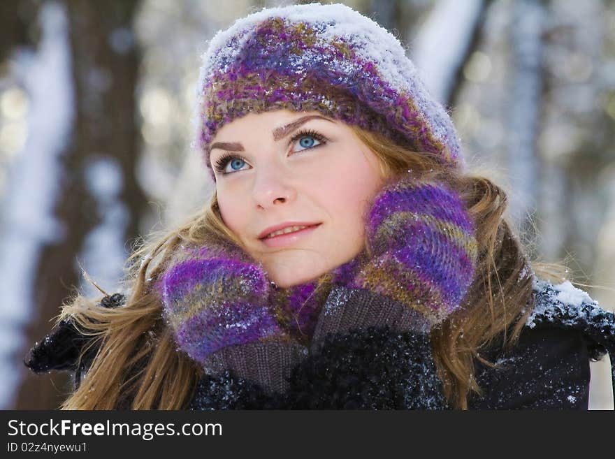 Portrait of sniling girl with snow