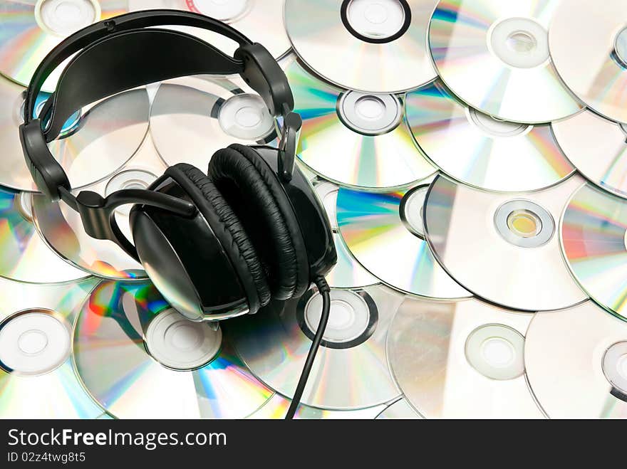 CDs background with headphones