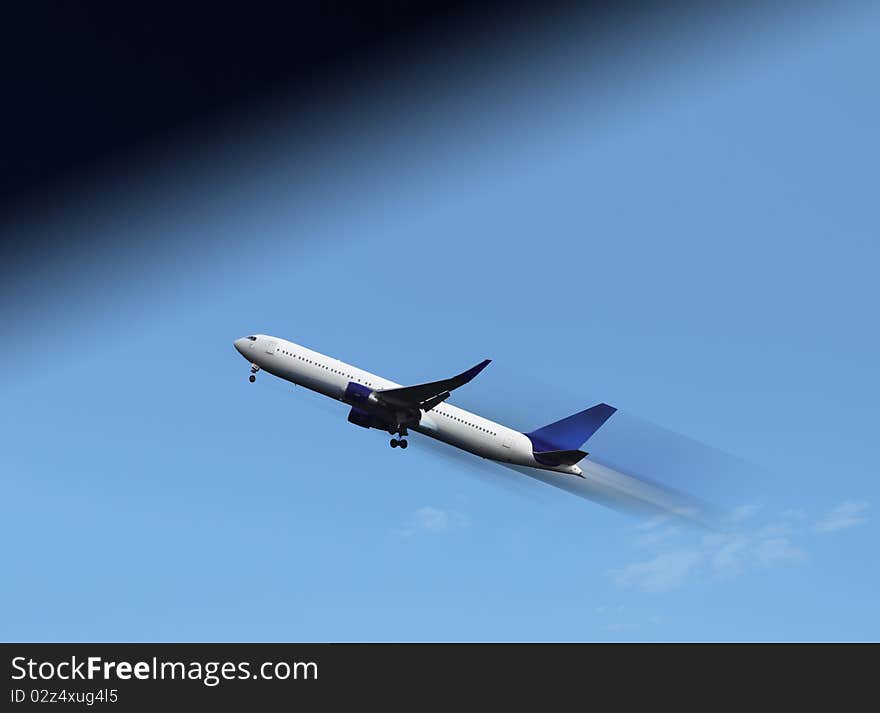 Aircraft in flight over the blue clouds. Aircraft in flight over the blue clouds