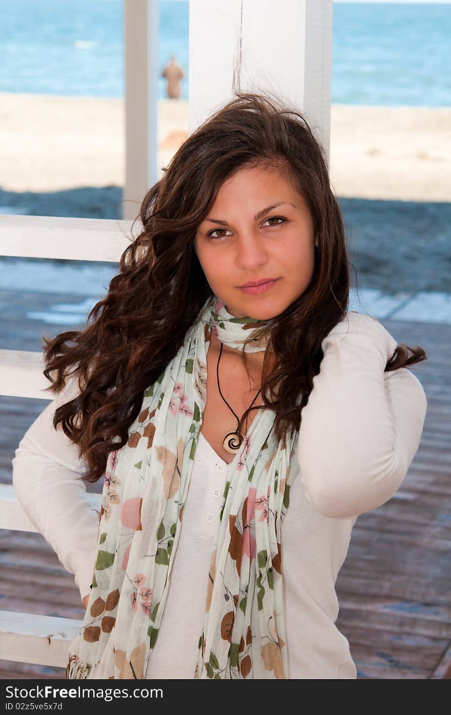 Attractive young woman brunette on the beach. Attractive young woman brunette on the beach