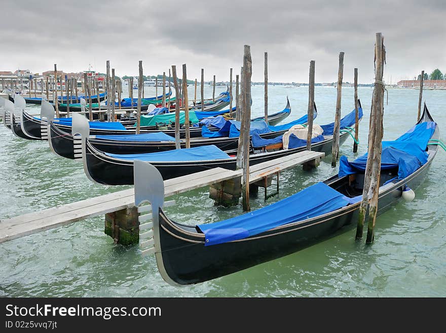 Gondolas on the San Marco canal in Venice, Italy. Gondolas on the San Marco canal in Venice, Italy.