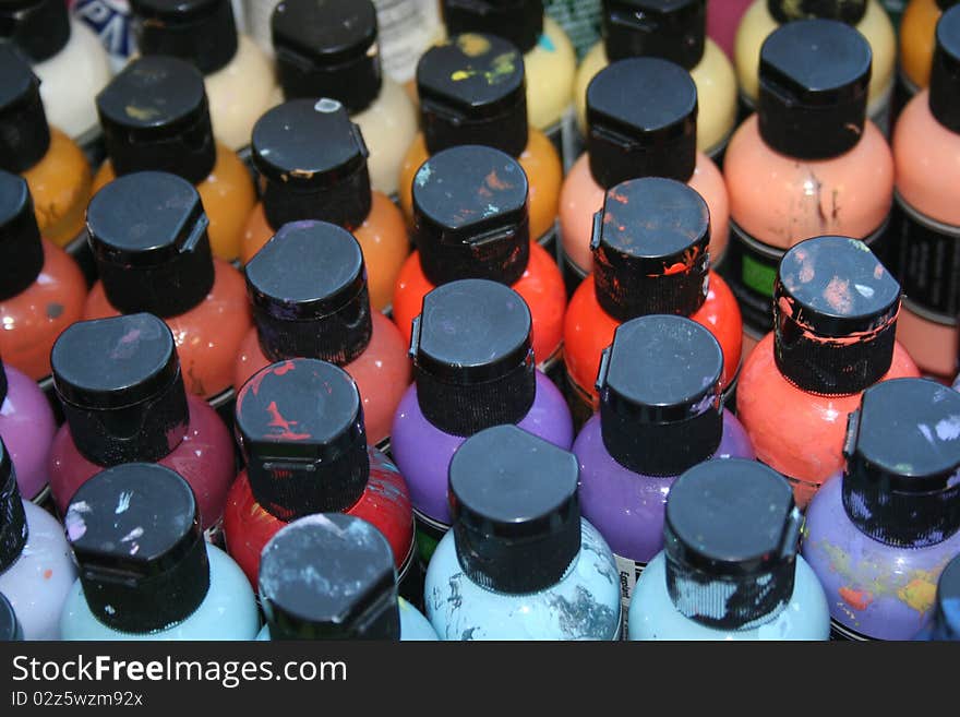 Bottles of colorful paint for arts and crafts classes. Bottles of colorful paint for arts and crafts classes