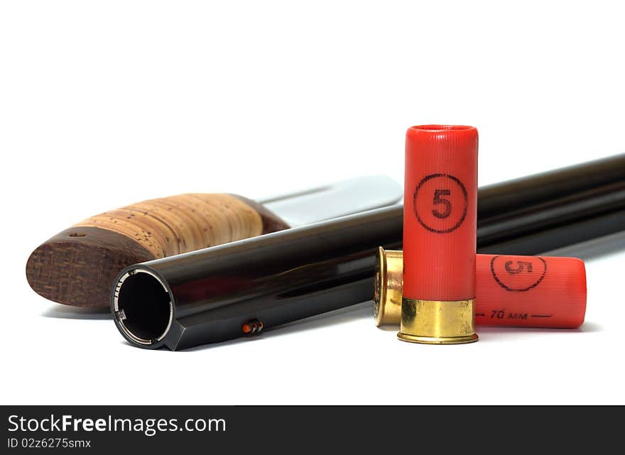 Barrel shotgun and cartridges knife on a white background. Barrel shotgun and cartridges knife on a white background.