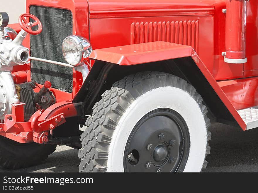 Red vintage fire truck (fire-engine) closeup