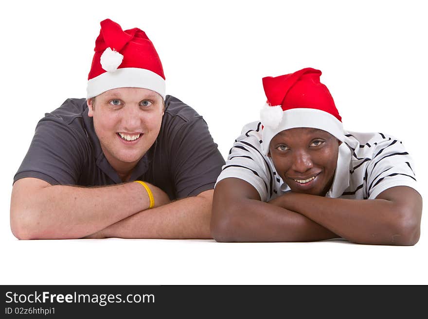 Two young friends - one black one white - getting ready for chiristmas. Two young friends - one black one white - getting ready for chiristmas.