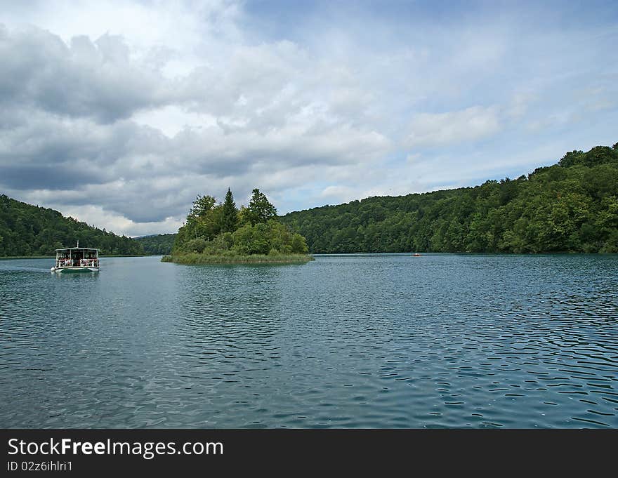 Landscape consisting of mountains and lake. The Plitvice Lakes, national park in Croatia