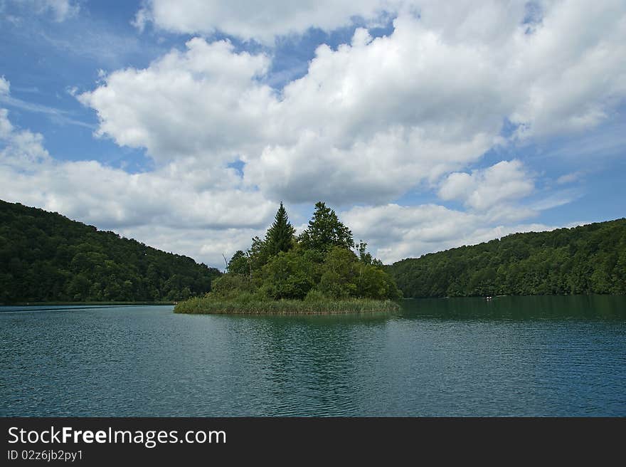 Landscape consisting of mountains and lake. The Plitvice Lakes, national park in Croatia