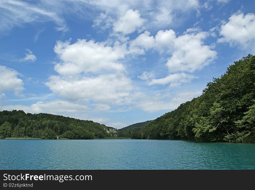 Landscape consisting of mountains and lake. The Plitvice Lakes, national park in Croatia