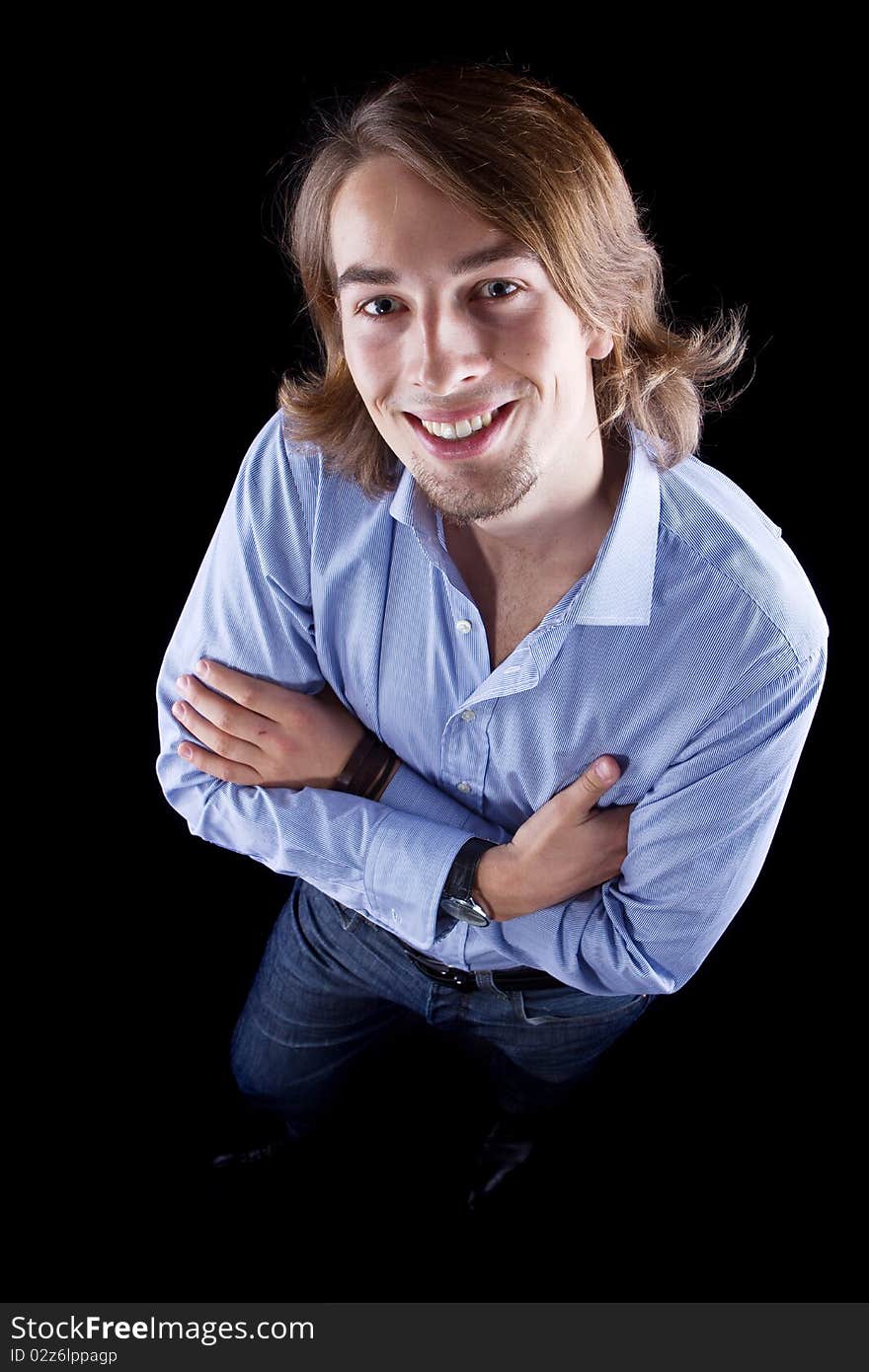 Young fresh business man with long hair - European. Young fresh business man with long hair - European.