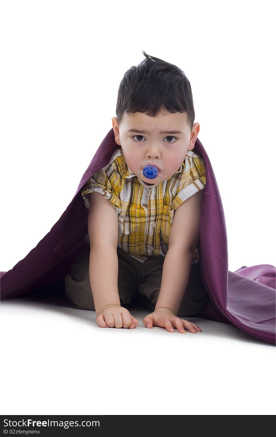 Cute boy with soother isolated on white background