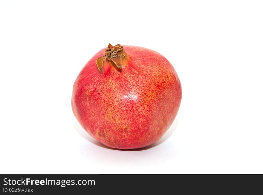 Red pomegranate on white background. Red pomegranate on white background