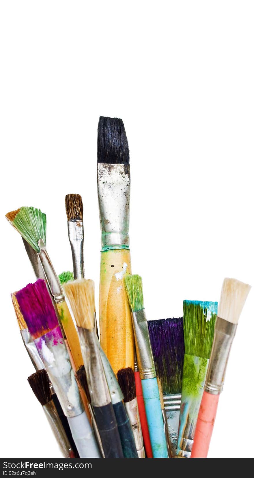 Old and used colorful paintbrushes