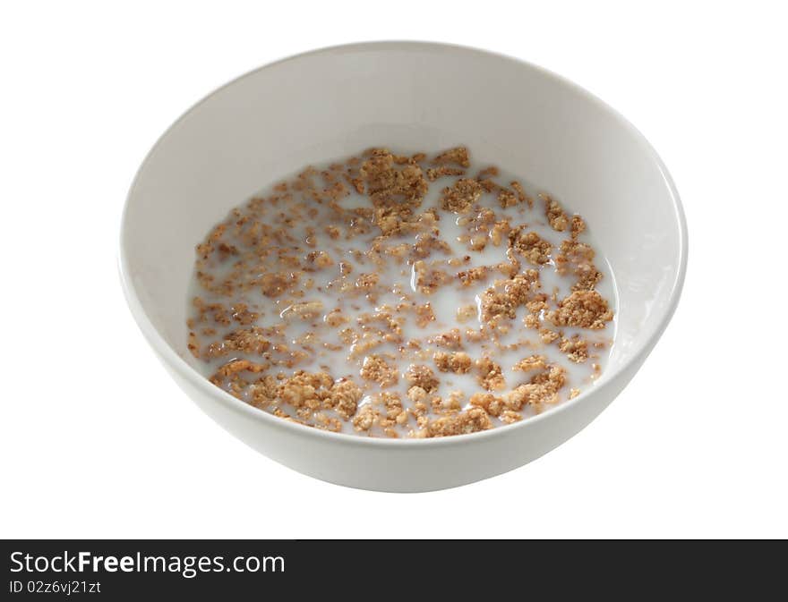 Cereals in an white bowl with milk. Cereals in an white bowl with milk