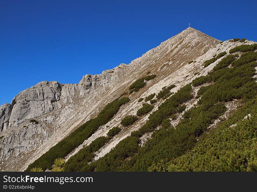 Hiking in Austrian mountains autumn blue sky. Hiking in Austrian mountains autumn blue sky