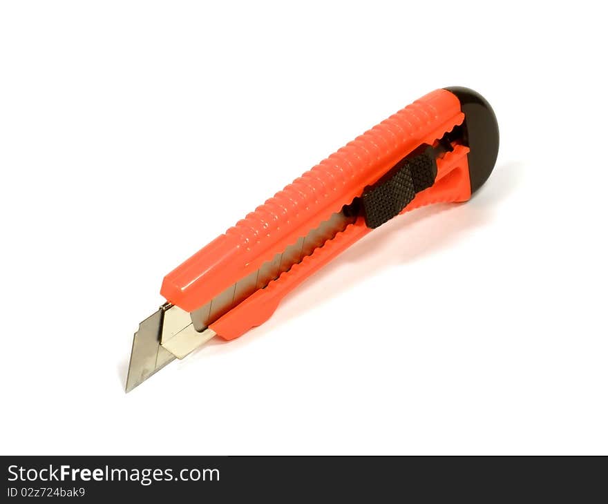 Office plastic paper knife on the white isolate background