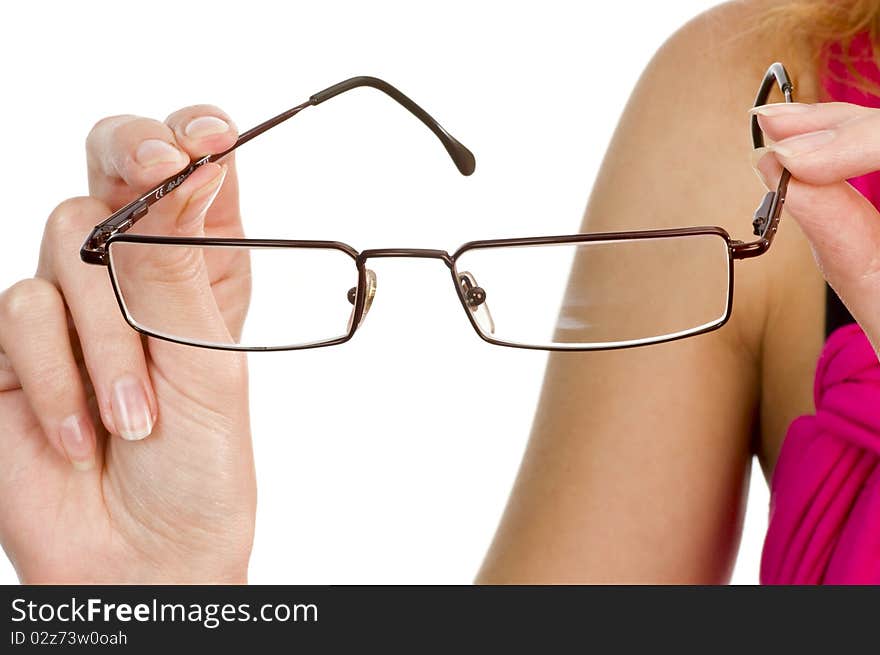 Glasses in hand isolated