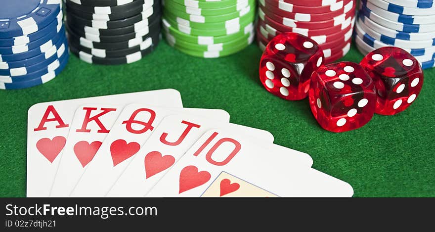 Poker background - red dices, cards in royal flash and poker chips. Poker background - red dices, cards in royal flash and poker chips