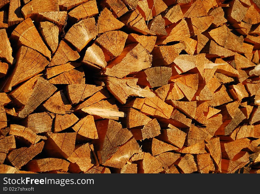 Fur-tree fire wood in a woodpile