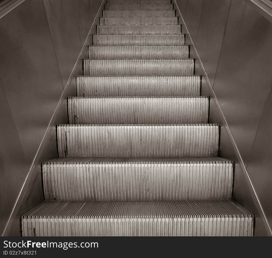 Escalator staircase - abstract image of escalator staircase