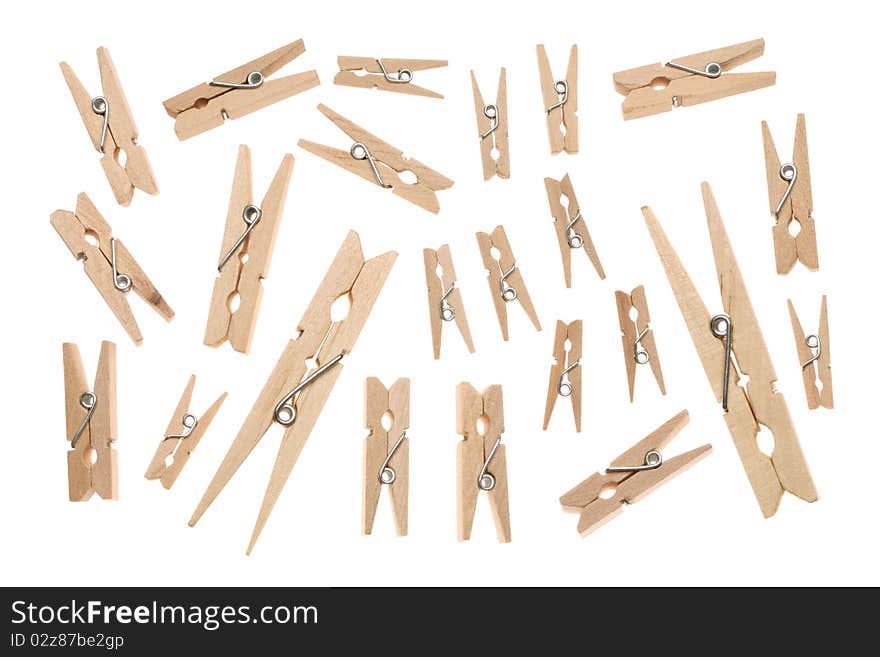 Wooden clothespins isolated on white background