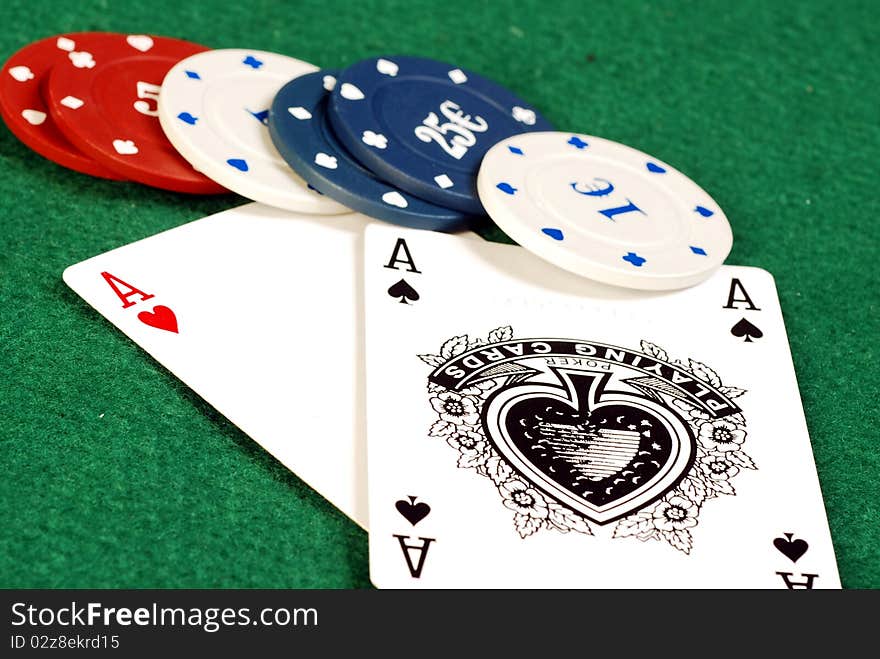 An ace of hearts and ace of spades with the point of the game