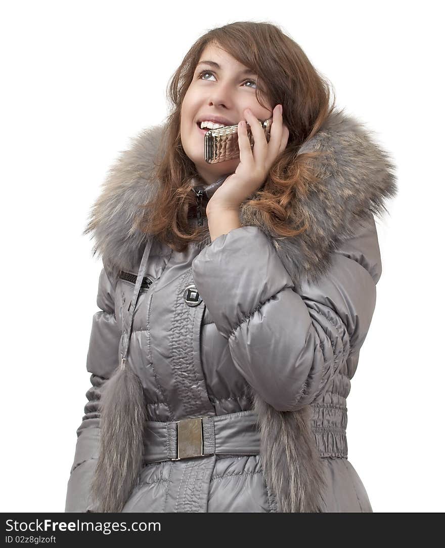 Girl talking on the phone on a white background