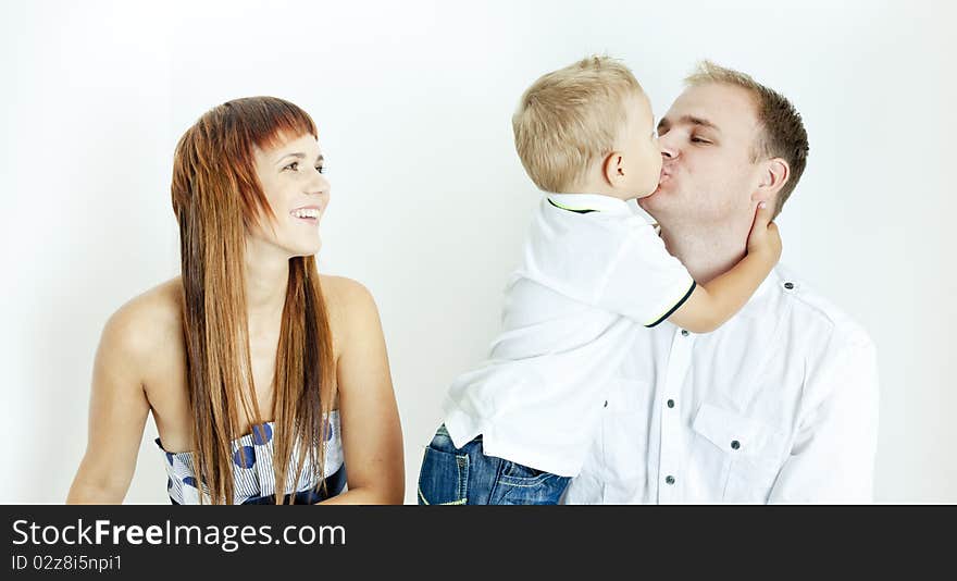 Portrait of parents with their little son. Portrait of parents with their little son