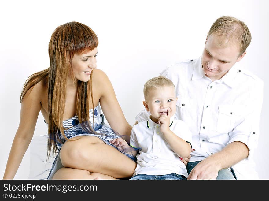 Portrait of parents with their little son. Portrait of parents with their little son