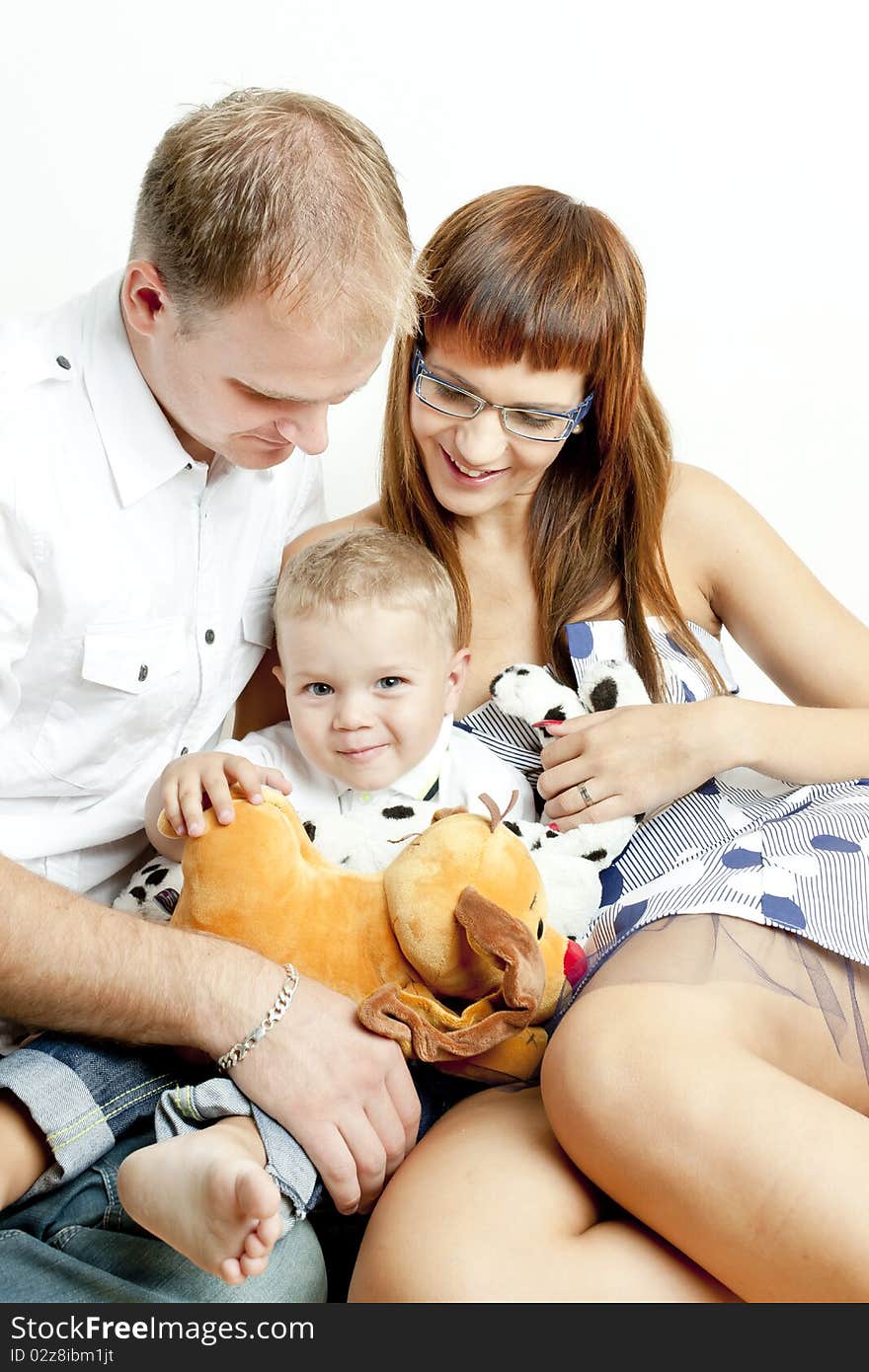 Portrait of parents with their little son. Portrait of parents with their little son