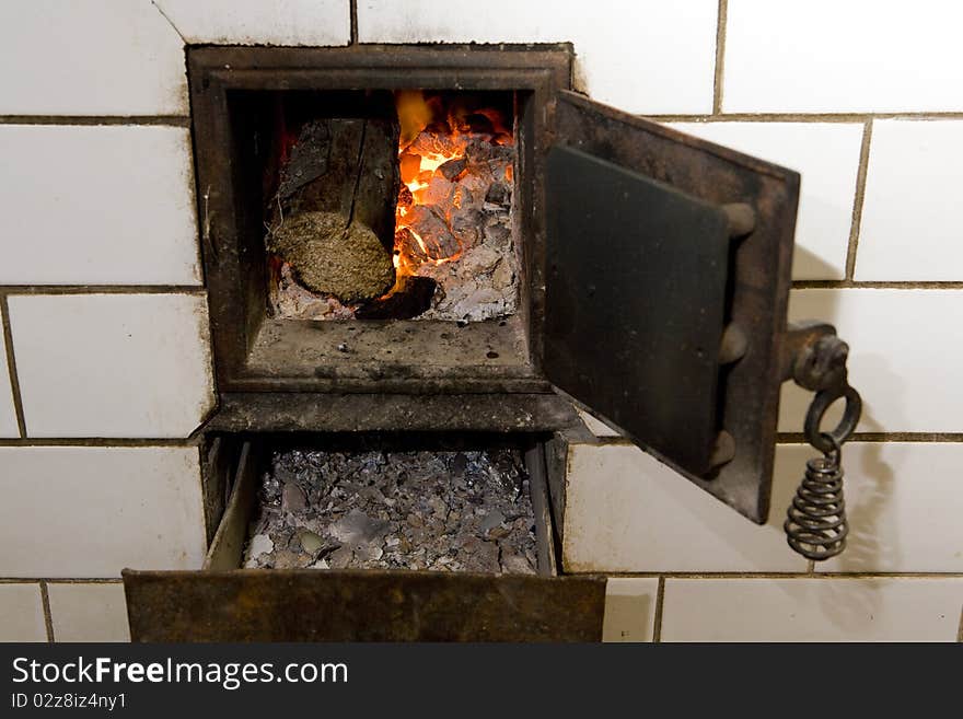 Close up of stove with fire