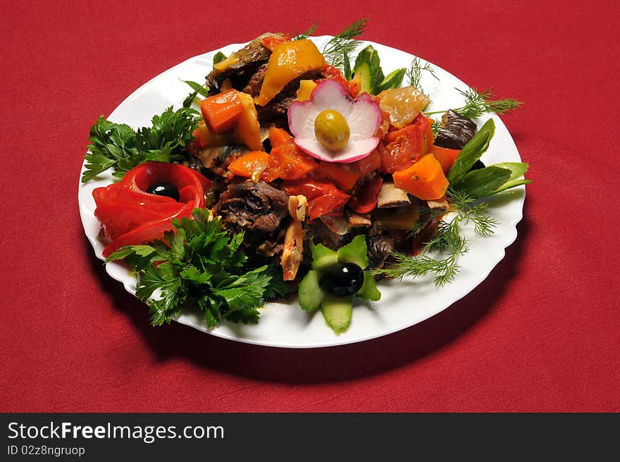 Beautiful meal from restaurant, on a red background. Beautiful meal from restaurant, on a red background