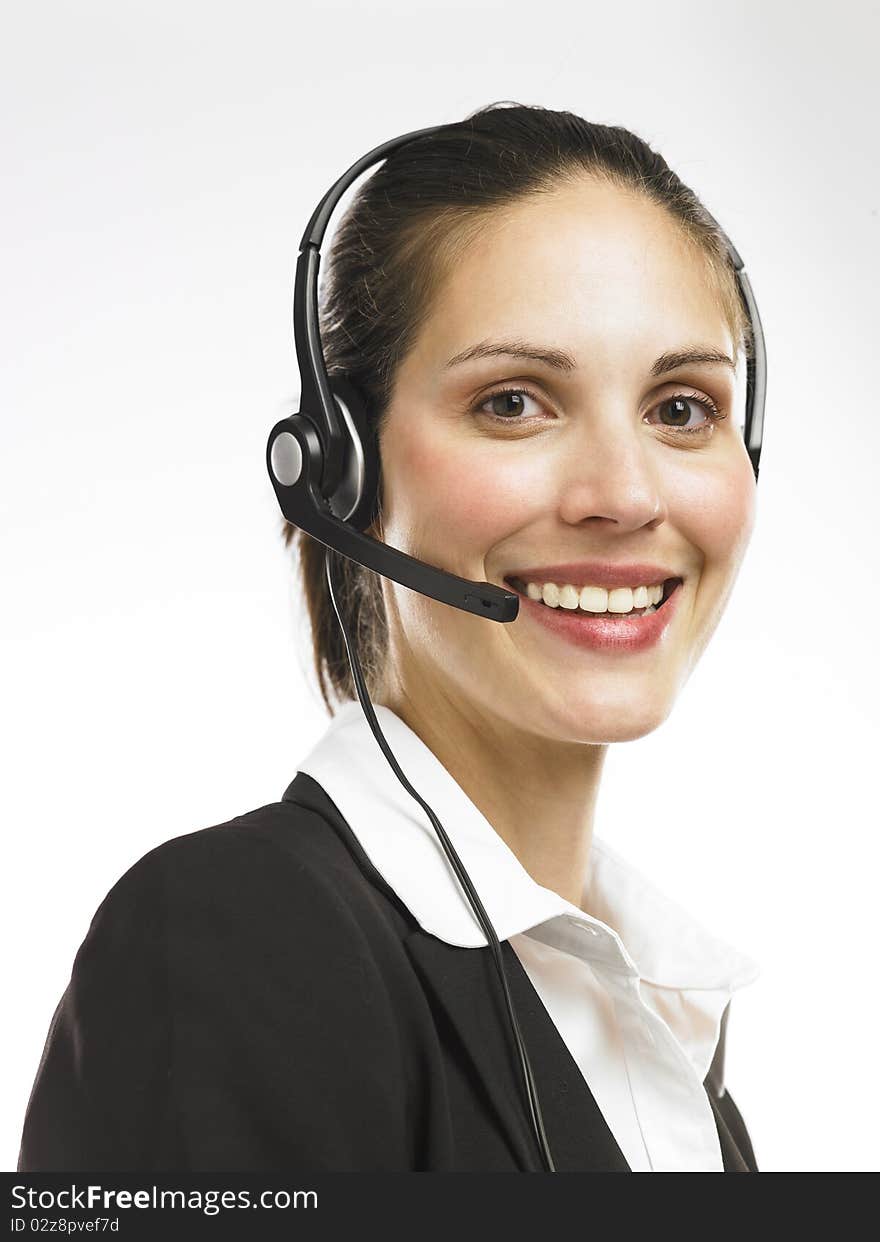 A nice looking telephone operator smiling. A nice looking telephone operator smiling