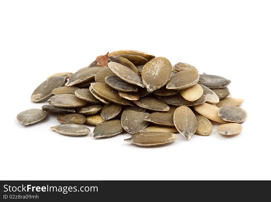 Pumpkin seeds isolated on white background