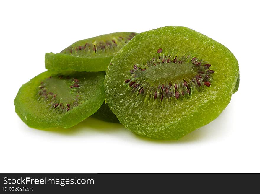 Dried kiwi fruit slices isolated on white background