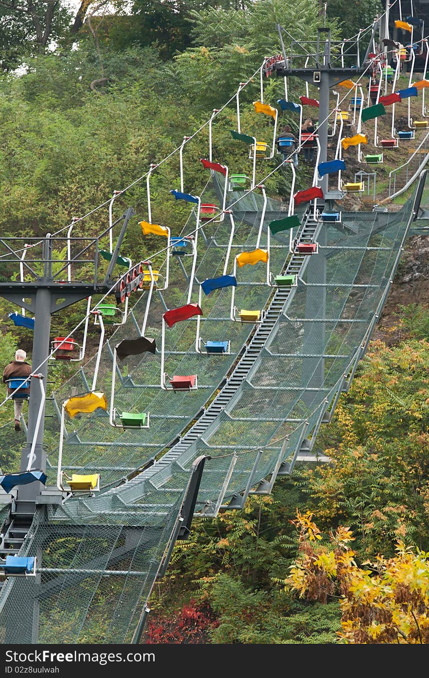 Funicular railway with varicoloured easy chair