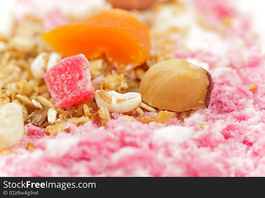 Muesli with ice cream closeup