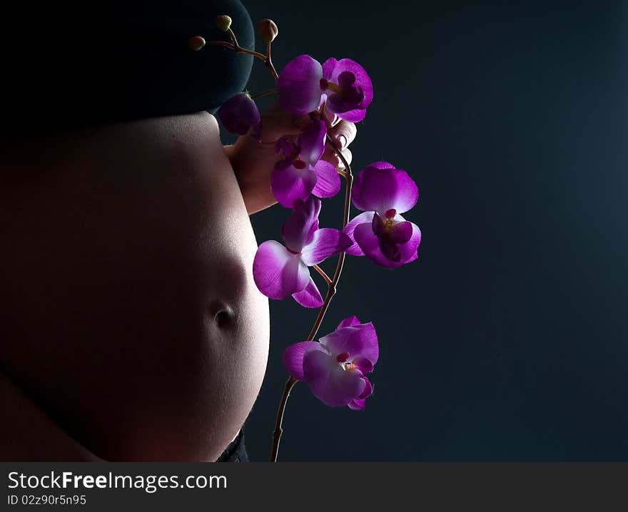 Six month old belly and orchid. Six month old belly and orchid