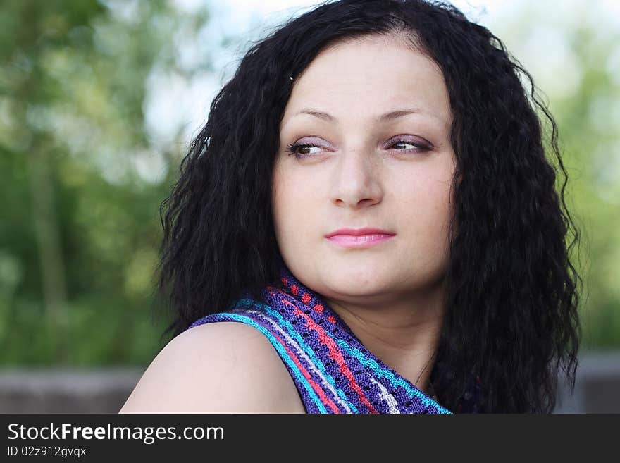 Portrait of smiling woman resting her chin on hand. Portrait of smiling woman resting her chin on hand