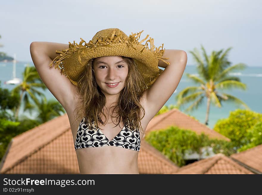 Teenager in front of a holiday resort