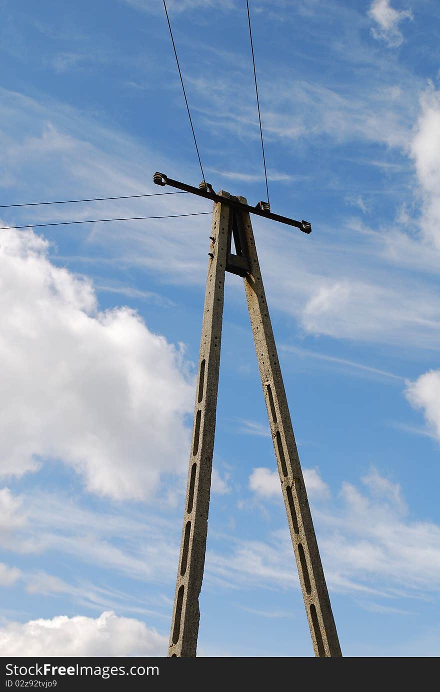 High voltage power line on the blue sky