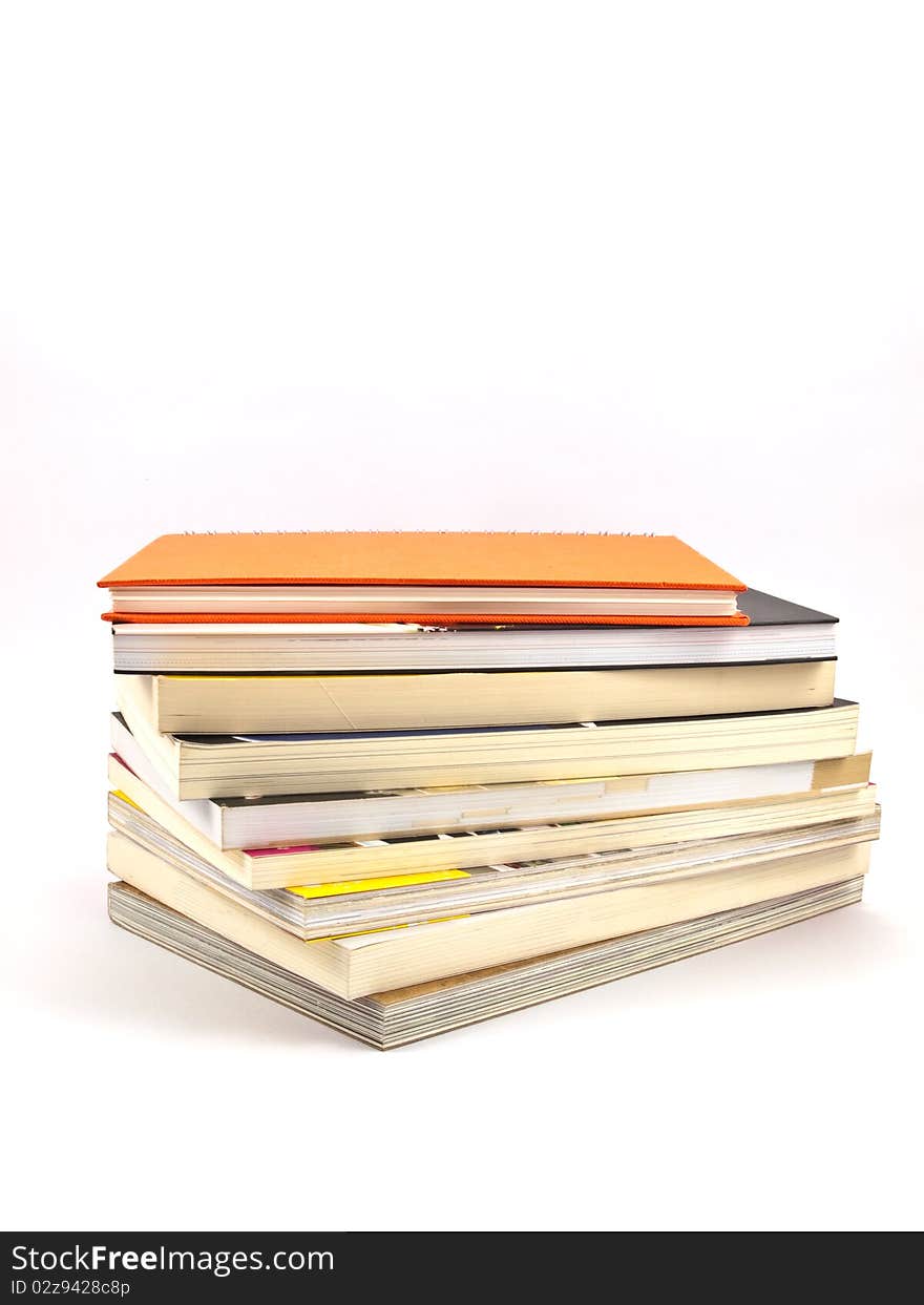 Book heap isolated on white background