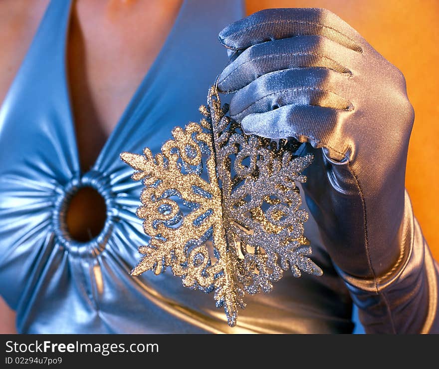 Woman holding snowflake