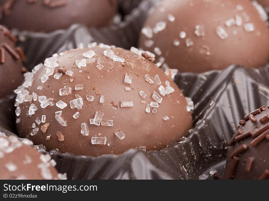 Truffle candy coated chocolate with decorative powdered for the occasion.