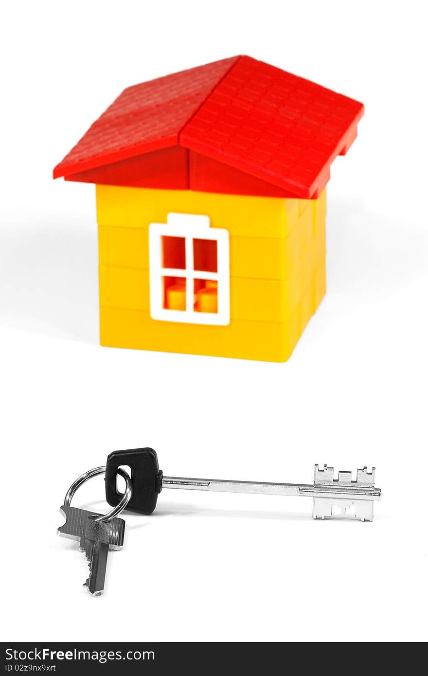 Toy, children's house and set of keys. Concept. Toy, children's house and set of keys. Concept