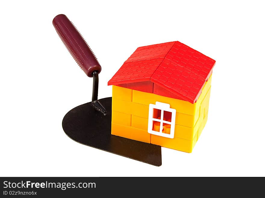 Toy, children's house and working tool. Concept. Toy, children's house and working tool. Concept