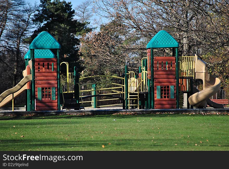 Park setting for outdoor playground apparatus. Park setting for outdoor playground apparatus