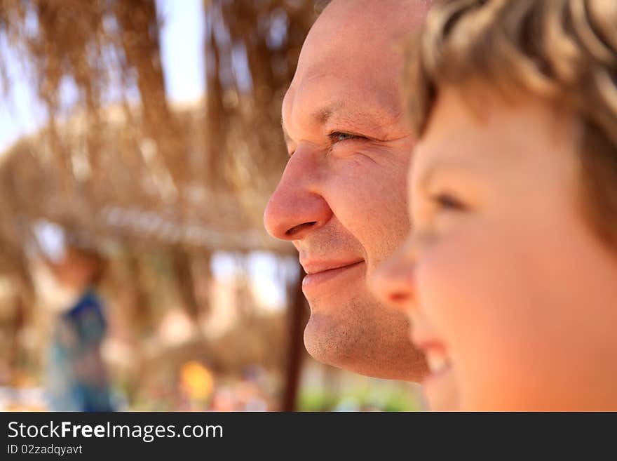 Photo of a smiling father and daughter