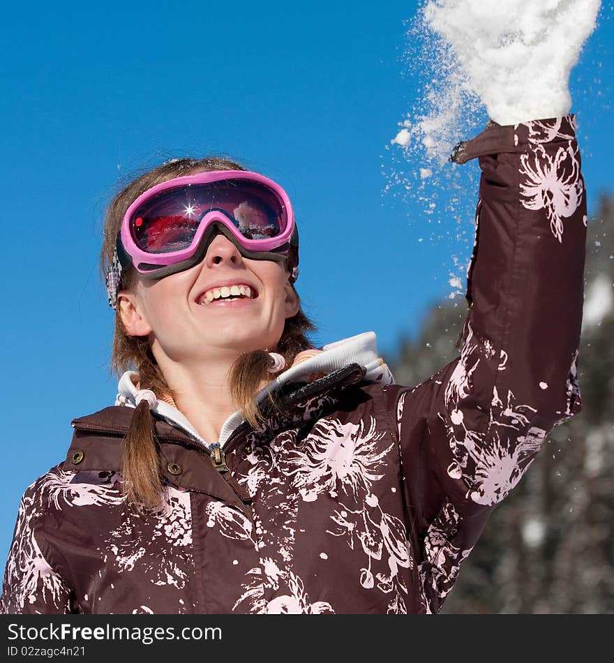 Girl Throwing Snowflake