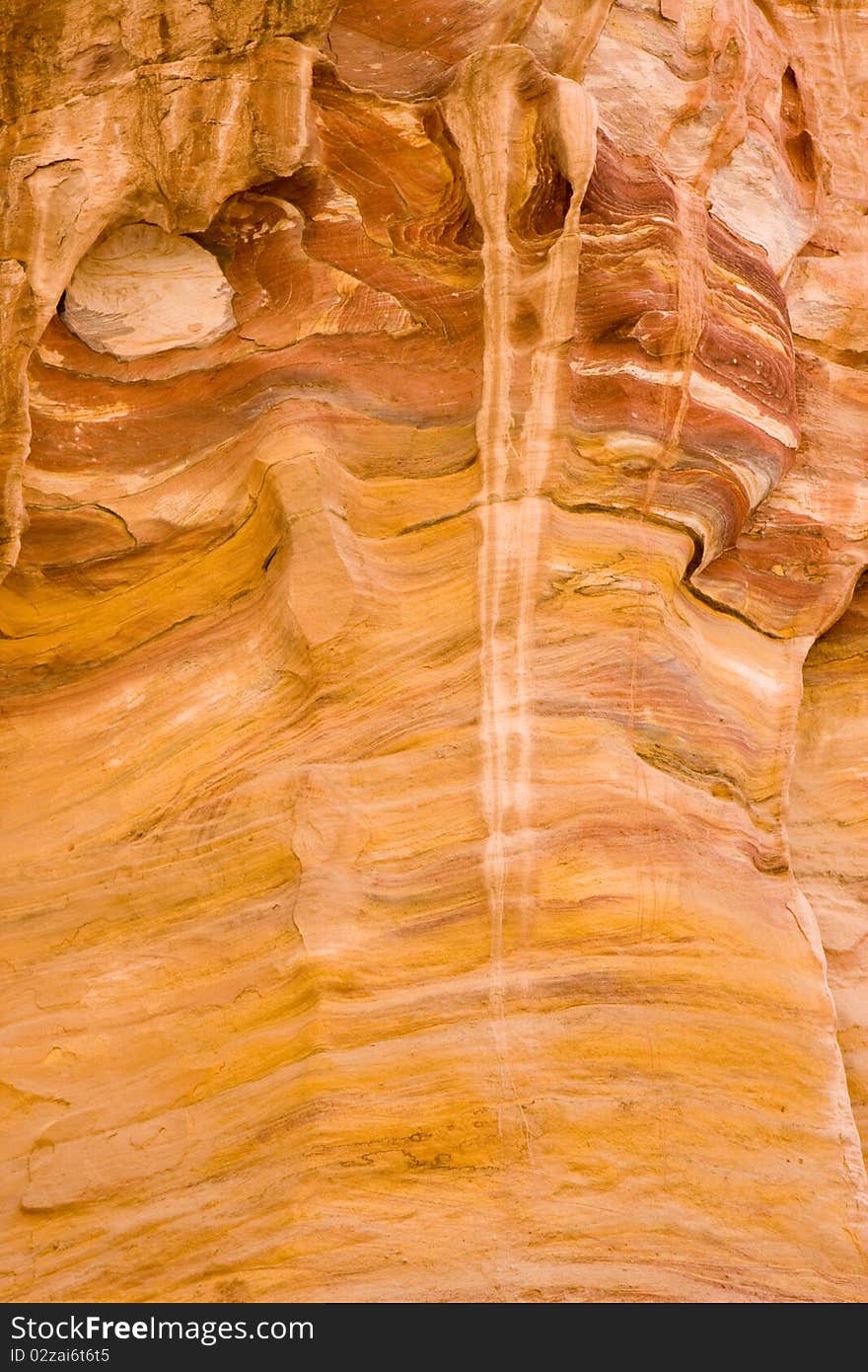 Patterns in brightly coloured stone at Petra